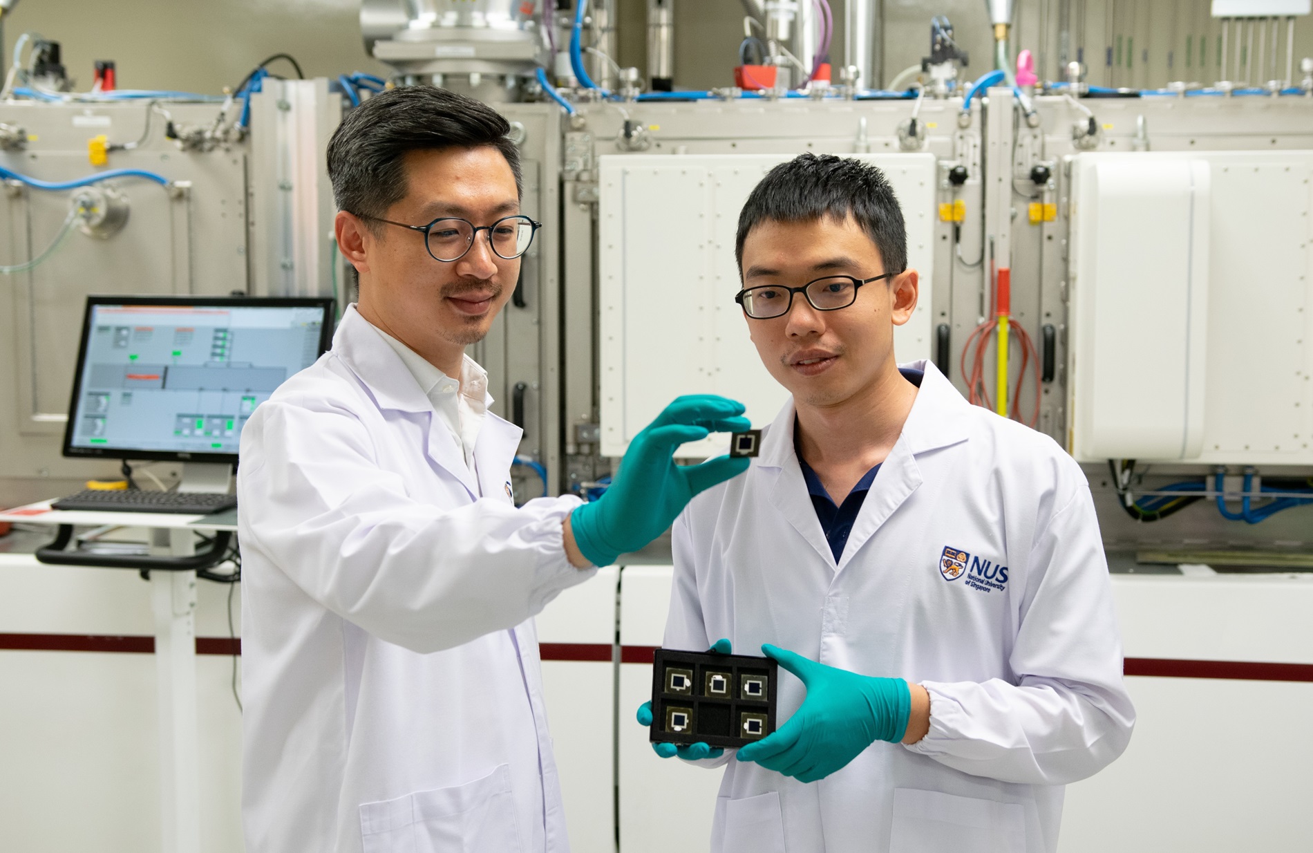 With the potential to achieve more than 50 per cent power conversion efficiency, this new triple-junction perovskite/Si tandem solar cell technology developed by Assistant Professor Hou Yi (left) and Dr Liu Shunchang (right) paves the way for a wide range of applications to harness solar energy with space constraints.