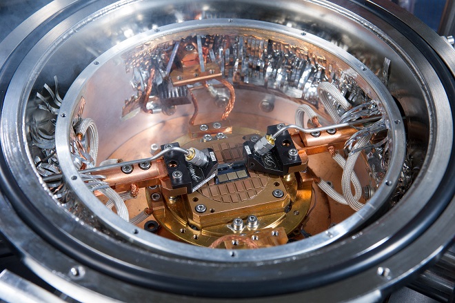 High-speed silicon-germanium chips and measurements probes can be seen inside a cryogenic probe station in a laboratory at the Georgia Institute of Technology