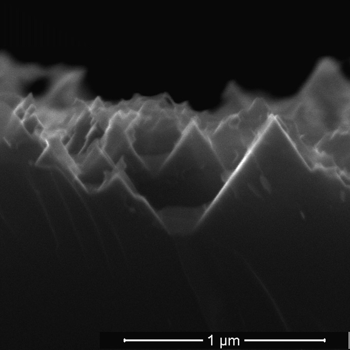 inverted pyramids etched into silicon by a chemical mixture over eight hours