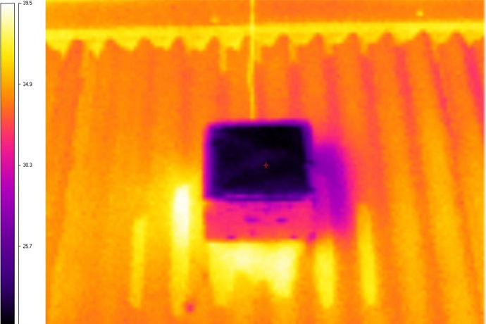 An infrared image showing the temperature difference between the new surface and an existing cool roof used in testing