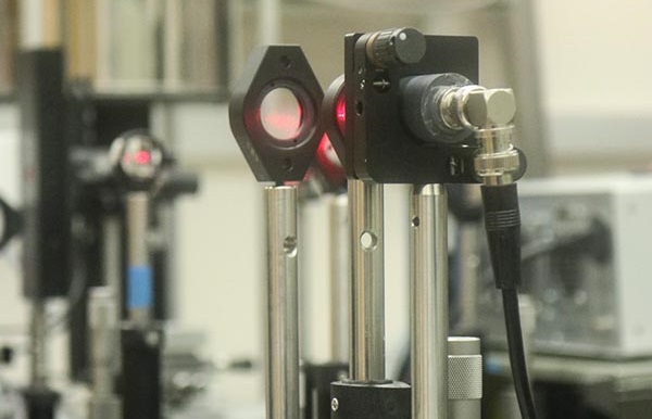 The laser and optics used to create excitons