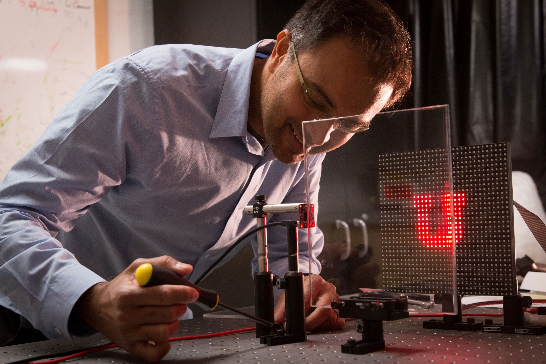 University of Utah electrical and computer engineering associate professor Rajesh Menon has discovered a way to create an optics-less camera in which a regular pane of glass or any see-through window can become the lens.