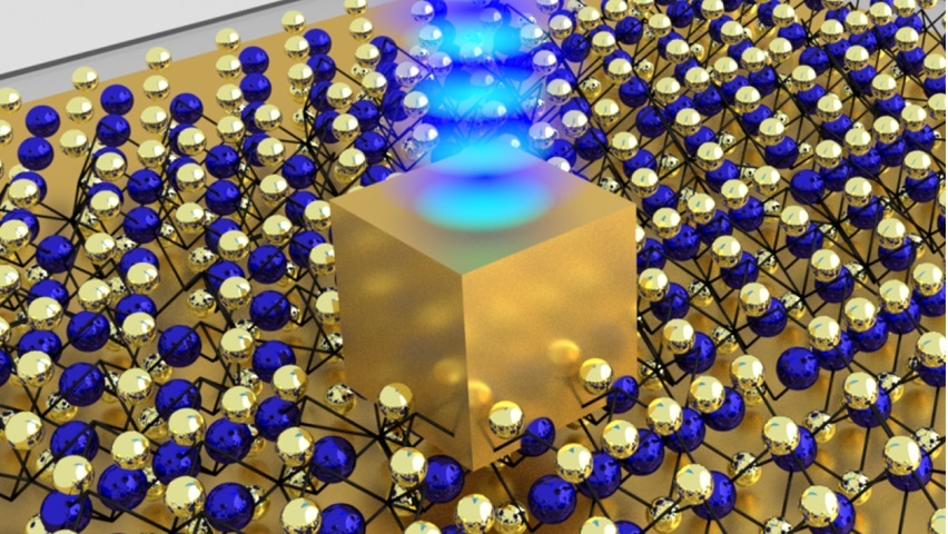 A single gold nanocube sits on top of an atom-thin material made of unique semiconductor crystals