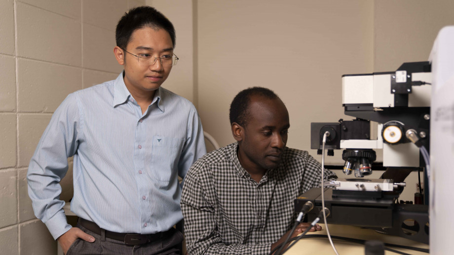 Dr Hieu Nguyen and PhD candidate Mike Tebyetekerwa. Image: Jack Fox, ANU