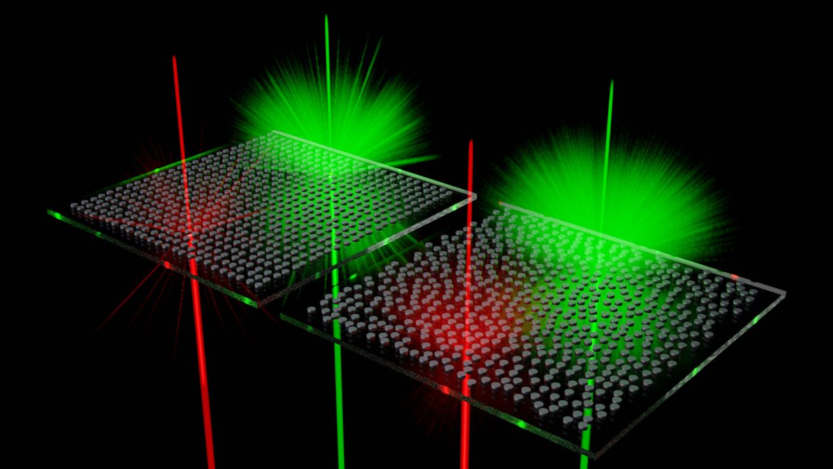 The scattering centers - silicon nanoparticles, shown here as black disks - on the transparent substrate scatter certain colors of light; other wavelengths are not affected.