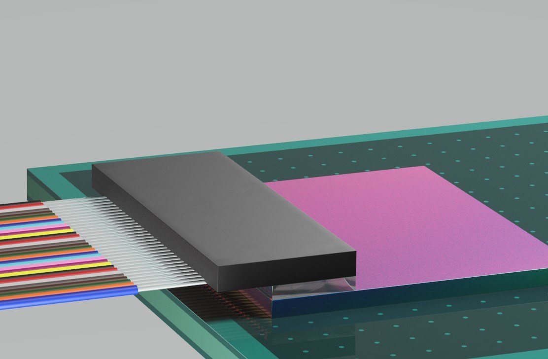Teramount PhotonicPlug assembled on silicon photonic chip that is processed with wafer level optics