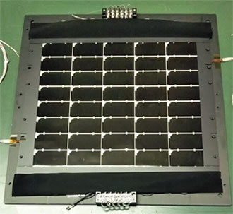 A flattened solar module anchored in a frame to facilitate measurement of its electrical characteristics
