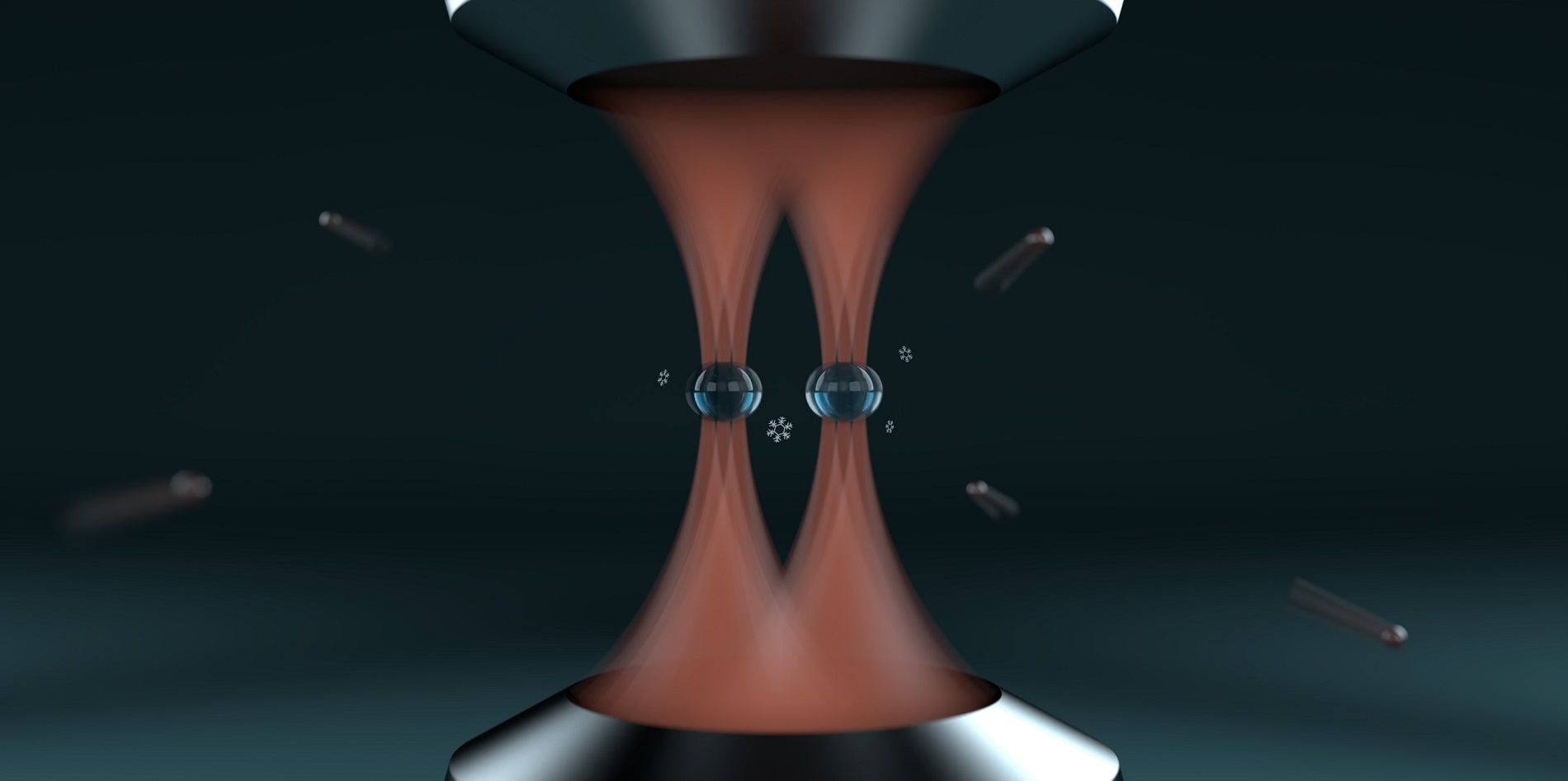 Using focused laser beams the ETH researchers cool two glass spheres to extremely low temperatures.