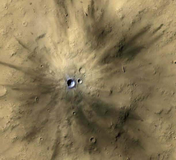 One of many fresh impact craters spotted by the UA-led HiRISE camera