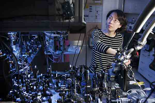 Physicist Na Young Kim, at the optical bench