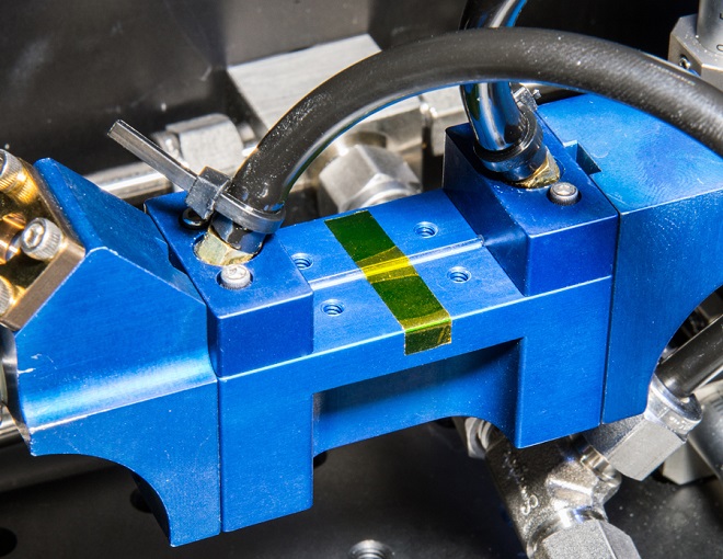 High harmonic generation takes place inside the translucent cylindrical waveguide shown here at the center of the image