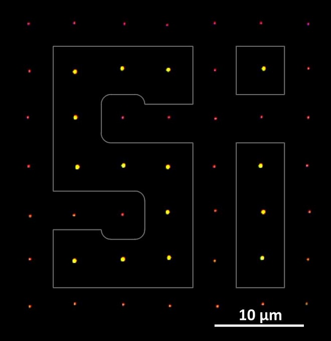 Laser-printed silicon nanoparticles in amorphous and crystalline phase