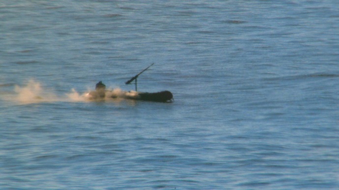 The resulting damage disables the boat in the Pacific Ocean