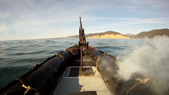 In tests off the California coast, the Lockheed Martin ADAM laser system burns through the hull of a military-grade boat