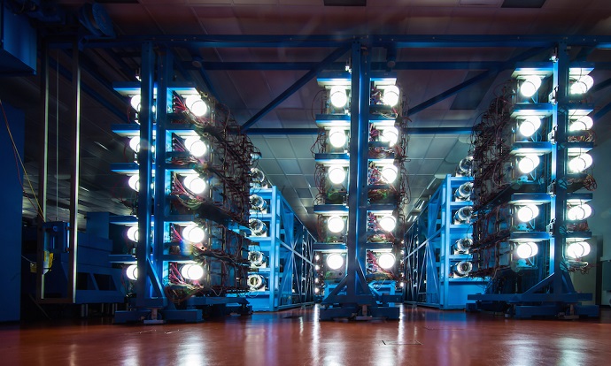 Flashtubes of the amplifiers in the OMEGA laser beams ignite during a shot at the Laboratory for Laser Energetics