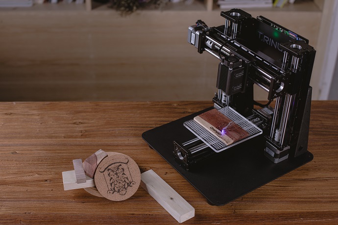 Trinus can be converted from a 3D printer to a laser engraver in 60 seconds
