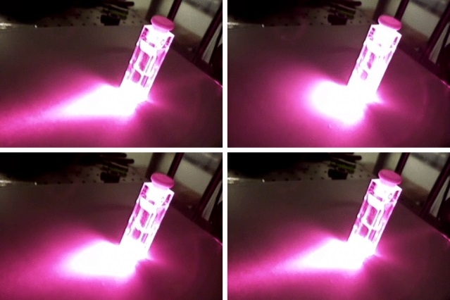 A mild temperature change radically alters the degree to which a solid-fluid mixture bends light