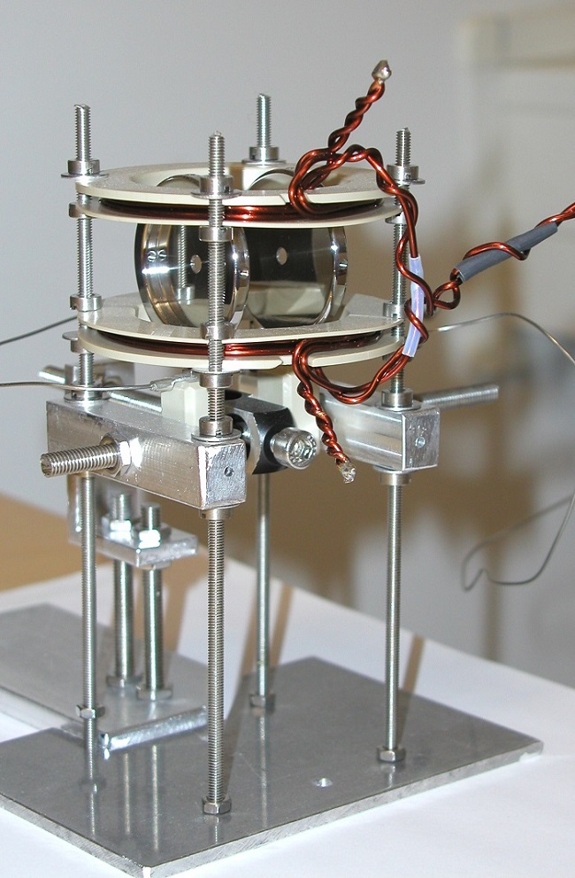 Arrangement of capacitor plates and coils