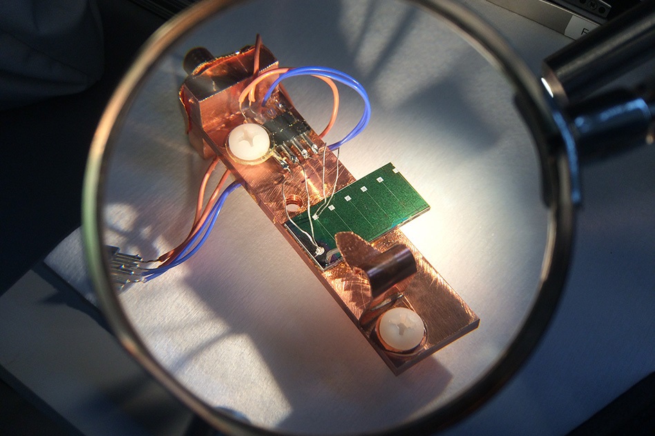 This experimental setup was used by the team to measure the electrical output of a sample of solar cell material, under controlled conditions of varying temperature and illumination