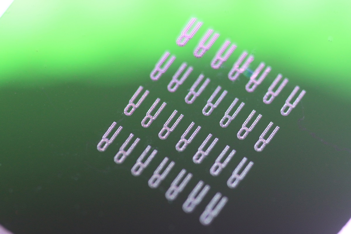 An array of 100 x 200 micron optical isolators uses sound to produce one-way light propagation