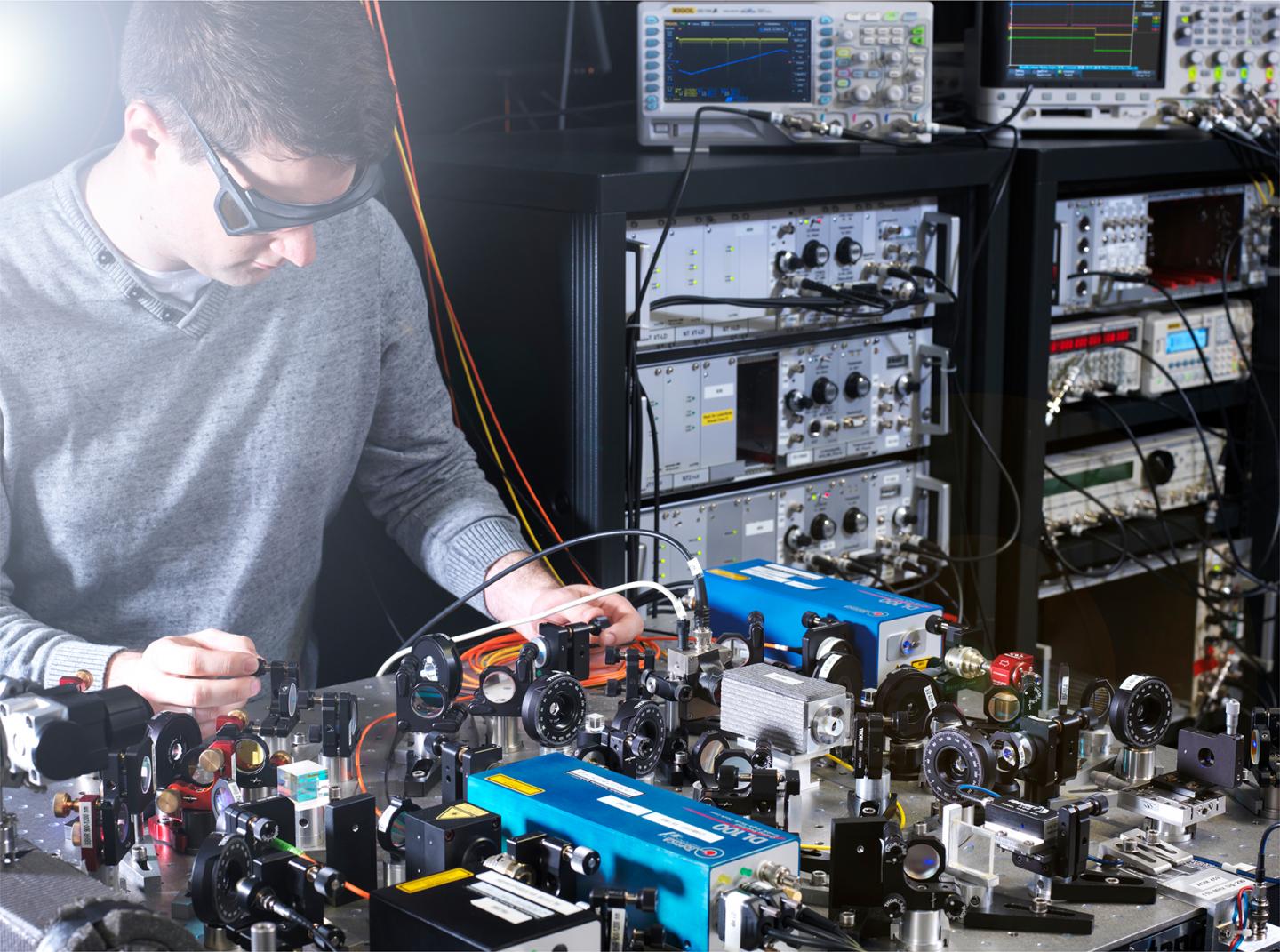 PTB scientist Johannes Thielking with the laser setup for measurements of the thorium-229 nuclear properties