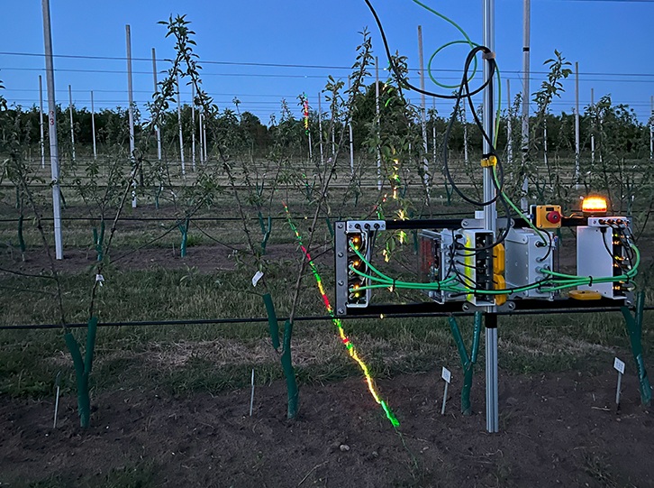 The laser scanner captures the ATB Potsdam test field at dusk.